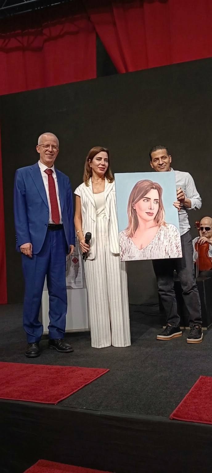 نبيه نصار يقدم لوحة بورتريه للإعلامية وفاء عاصي ضمن معرض بيروت العربي الدولي للكتاب